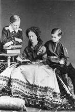 Grand Duchess Alexandra Josefovna of Russie with the Grand Dukes Nicholas and Constantine Constantinovich of Russia