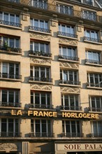 France, Paris 3e, rue beaubourg, immeuble, enseigne sur la facade, la france horlogere,