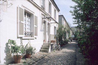 France, Paris 14e, maisons individuelles, esprit village, villa derriere le 105 rue didot, ruelle pavee,