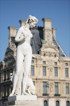 France, statue and louvre in the background