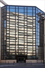 France, reflections in a glass building