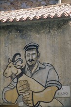 Italie, sardaigne, centre, orgosolo, village, fresques sur les murs des maisons, dessins, decor,