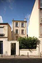 France, Small house with garden on street
