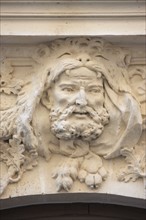 Mascaron de la porte d'entrée de l'immeuble 12 rue de Jouy à Paris