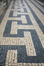 portugal, lisbonne, lisboa, signes de ville, baixa, banque, lion, sculpture, paves sol, voirie
Date : septembre 2011