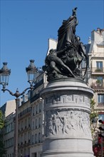 France, Ile de France, Paris 17e arrondissement, Place de Clichy, statue du marechal Moncey, sculpture, piedestal, relief representant la defense de Paris par Moncey a la barriere de Clichy, en 1814