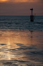 Trouville sur Mer, plage au soleil couchant