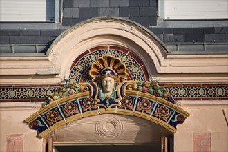 Mers les Bains, pediment of a facade on the seafront