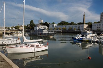 Lorient, port, grey customs boat and sailing boats