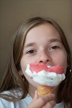 Teenager eating an ice cream