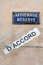 Paris, plaque reading 'Affichage réservé'