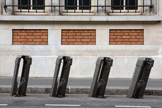 Paris, marker, bollards to lock the Vélib' bicycles