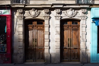 Paris, symmetrical building entrance doors