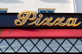 Paris, pizzeria sign