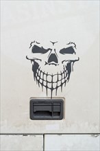 Skull and crossbones on a delivery truck
