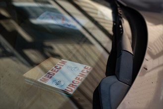 Paris, sticker of a French emergency doctor on the windscreen