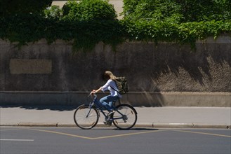 Pars, woman riding a bicycle