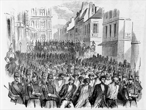 Passage of a column of captive insurrectionists through Paris -