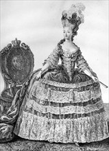 Marie-Antoinette in cherry-coloured satin court dress