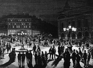 Janvier 1872. Paris : la place de l'Opéra éclairée au gaz.