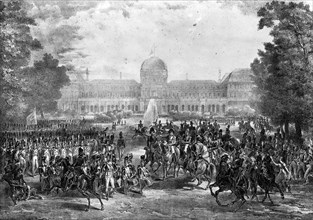 Napoleon I looks over his army at the Tuileries.