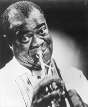 The United States.  Louis " Satchmo " Armstrong.  Trumpet player.