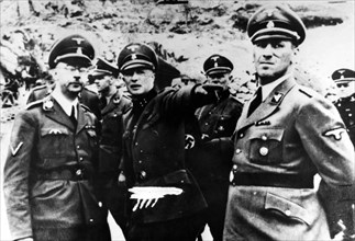 Himmler and Kaltenbrunner visit a concentration camp.