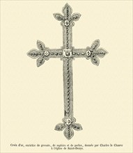 Croix d'or, enrichie de grenats, de saphirs et de perles, donnée par Charles le Chauve à l'église de Saint-Denis.