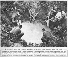 Canadiens faisant leur toilette dans un cratère de mine.