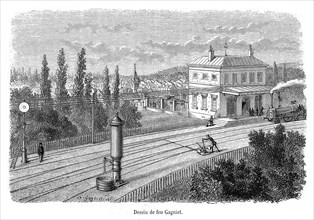 Chemin de fer. Gare et aiguillage en 1865. Gravure.