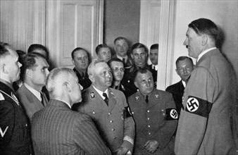 Adolf Hitler. Der Führer im Kreise seiner nächsten Mitarbeiter am Abend der Reichstagswahl vom 29.