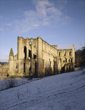 Rievaulx Abbey church from the North East with snow, North Yorkshire, 1998