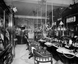 The gentlemen's hairdressing saloon in the Hotel Cecil in The Strand, London, 1911