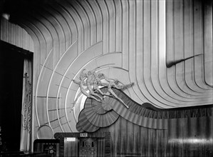 Detail of four relief figures at the Odeon, Leicester Square, London, 1937