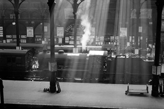 Steam locomotives wait at Liverpool Street Station, London