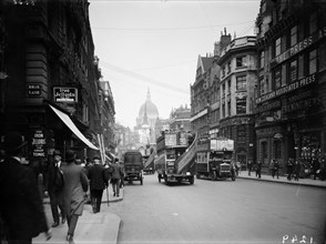 Open-topped omnibuses in Fleet Street, London Artist