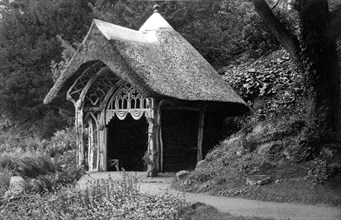 Rustic thatched summerhouse, Belvoir, Leicestershire, c1900
