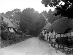 Timber-framed and thatched cottages at Wherwell, Hampshire, 1927