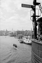 The River Thames at Stepney, London with a shipping signal in the foreground, c1945-c1965