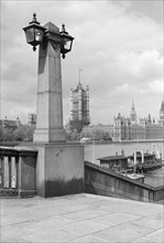 View across the River Thames towards the Palace of Westminster, London, c1945-c1965