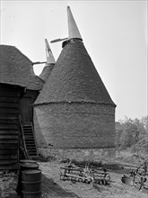 Exterior view of an oast house at Hope Farm, Fairfield, Kent, 1956