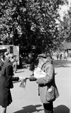 Newspaper seller, London, c1945-c1965