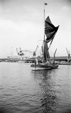 A Thames sailing barge in the Royal Albert Dock, Canning Town, London, c1945-c1965