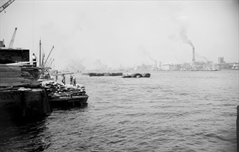 A view across the River Thames at Woolwich Reach, c1945-c1965