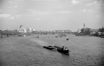 A view from Waterloo Bridge towards St Paul's Cathedral and the City of London, c1945-c1965