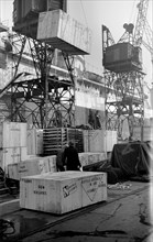 Cased car parts bound for Australia being loaded, King George V Dock, London, c1945-c1965