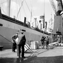Loading a ship at the North Quay, West India Docks, London, c1945-c1965