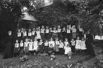 Children outside Badby School, Northamptonshire, c1896-c1920