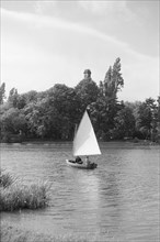 A small sailing boat on the River Thames, c1945-c1965