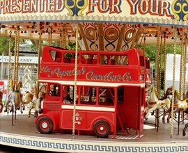 Children's carousel at a funfair in Street, Somerset, c2000